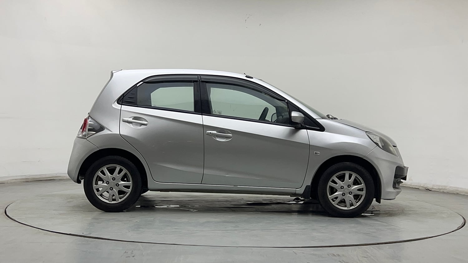 Used 2013 Honda Brio V MT Petrol Manual exterior RIGHT SIDE VIEW