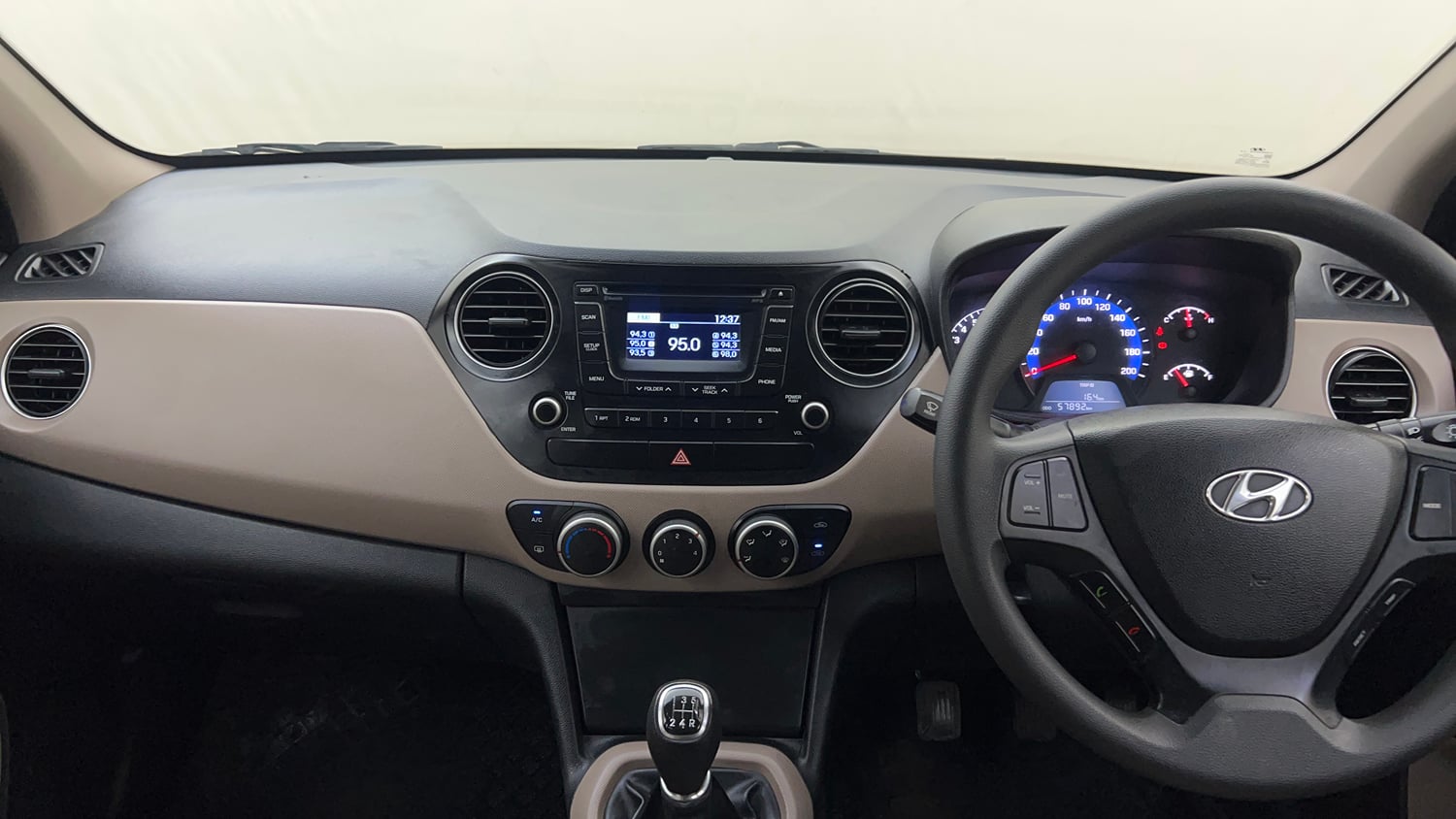 Used 2014 Hyundai Xcent S 1.2 Petrol Manual interior MUSIC SYSTEM & AC CONTROL VIEW