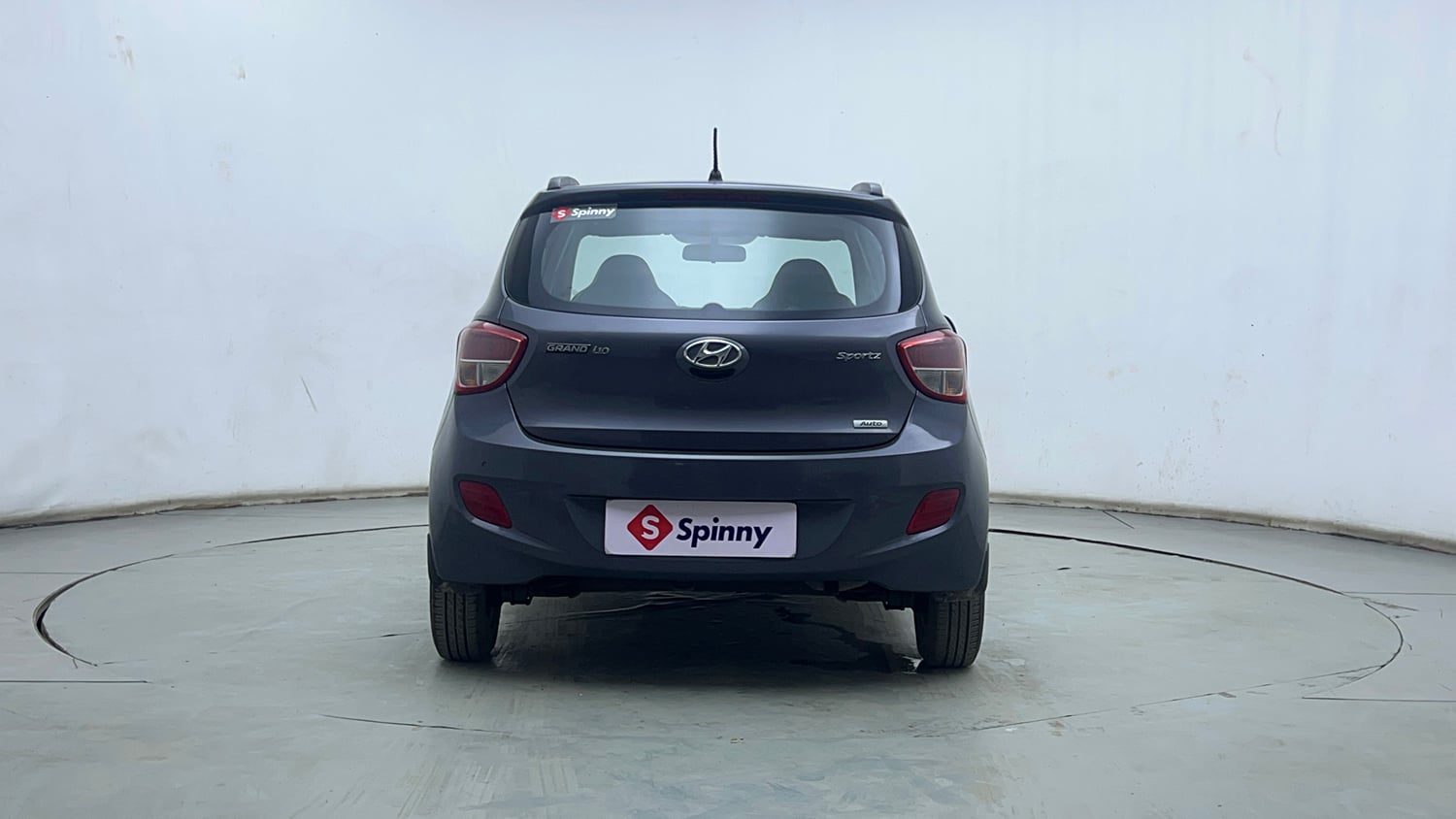 Used 2014 Hyundai Grand i10 Sportz AT 1.2 Kappa VTVT Petrol Automatic exterior BACK VIEW