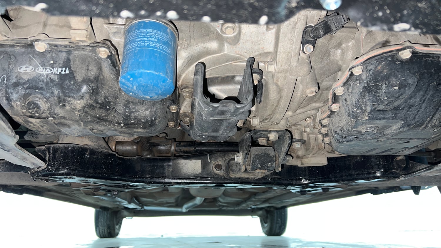 Used 2017 Hyundai Grand i10 Sportz (O) AT 1.2 Kappa VTVT Petrol Automatic extra FRONT LEFT UNDERBODY VIEW