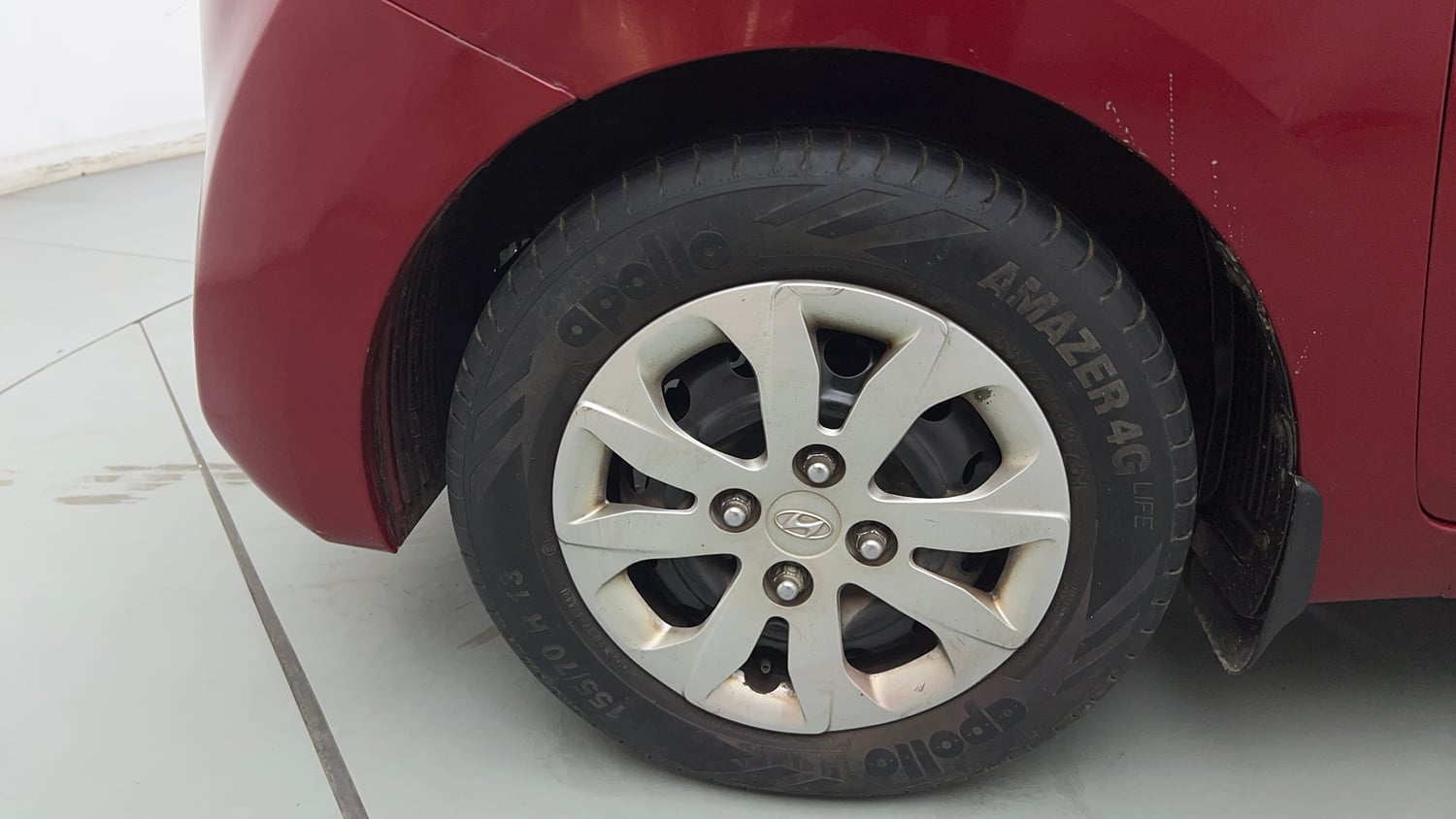 Used 2014 Hyundai Eon Sportz Petrol Manual tyres LEFT FRONT TYRE RIM VIEW