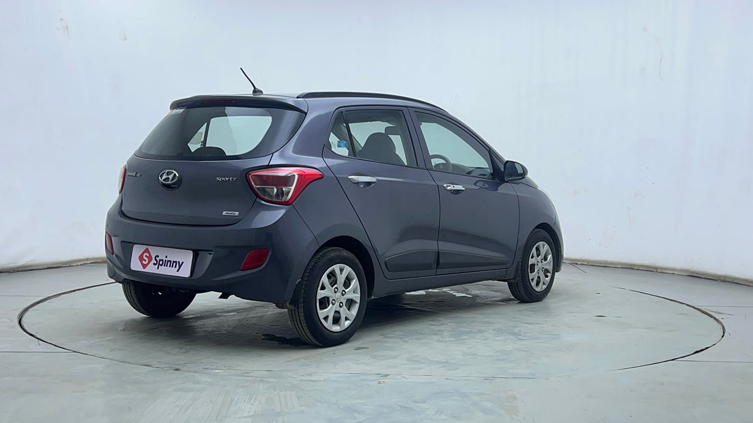 Used 2014 Hyundai Grand i10 Sportz AT 1.2 Kappa VTVT Petrol Automatic exterior RIGHT REAR CORNER VIEW