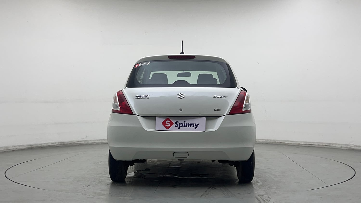 Used 2016 Maruti Suzuki Swift Lxi (O) Petrol Manual exterior BACK VIEW
