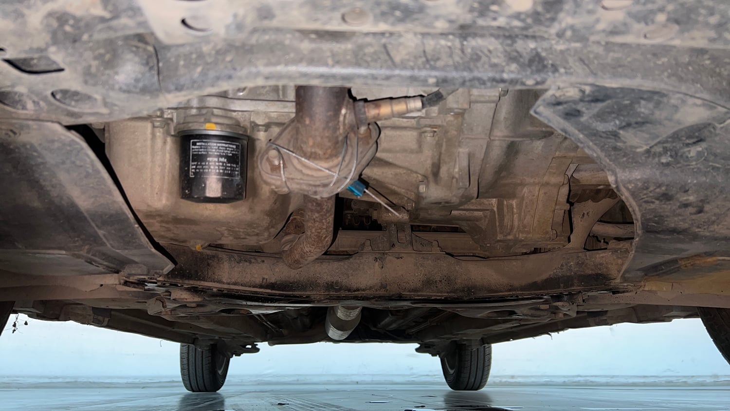 Used 2015 Maruti Suzuki Swift ZXi Petrol Manual extra FRONT LEFT UNDERBODY VIEW