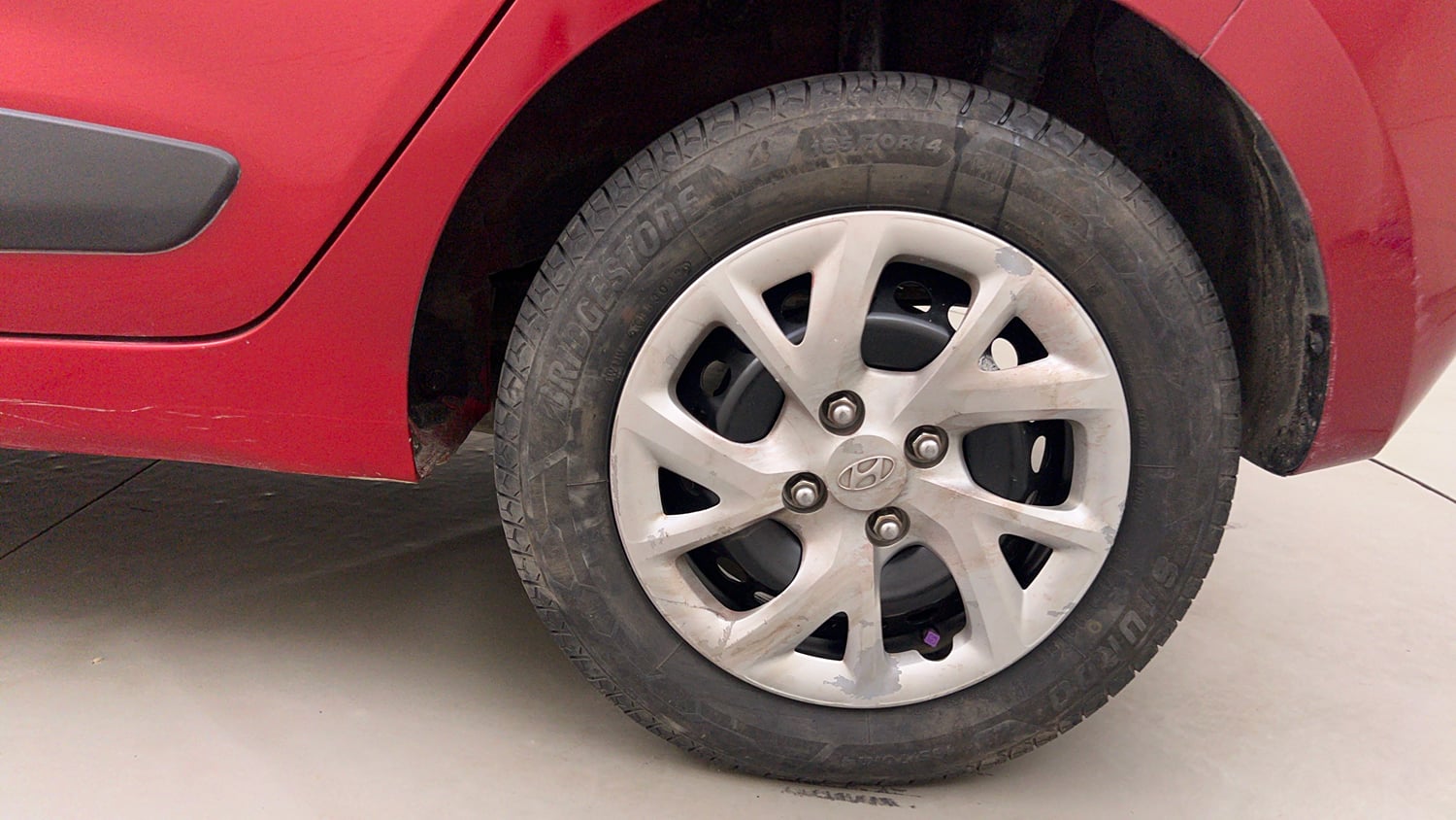 Used 2018 Hyundai Grand i10 Sportz (O) 1.2 Kappa VTVT Petrol Manual tyres LEFT REAR TYRE RIM VIEW