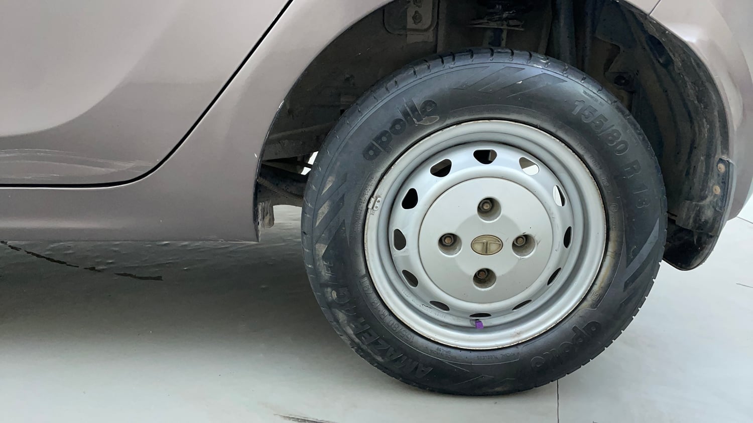 Used 2016 Tata Tiago Revotron XM Petrol Manual tyres LEFT REAR TYRE RIM VIEW