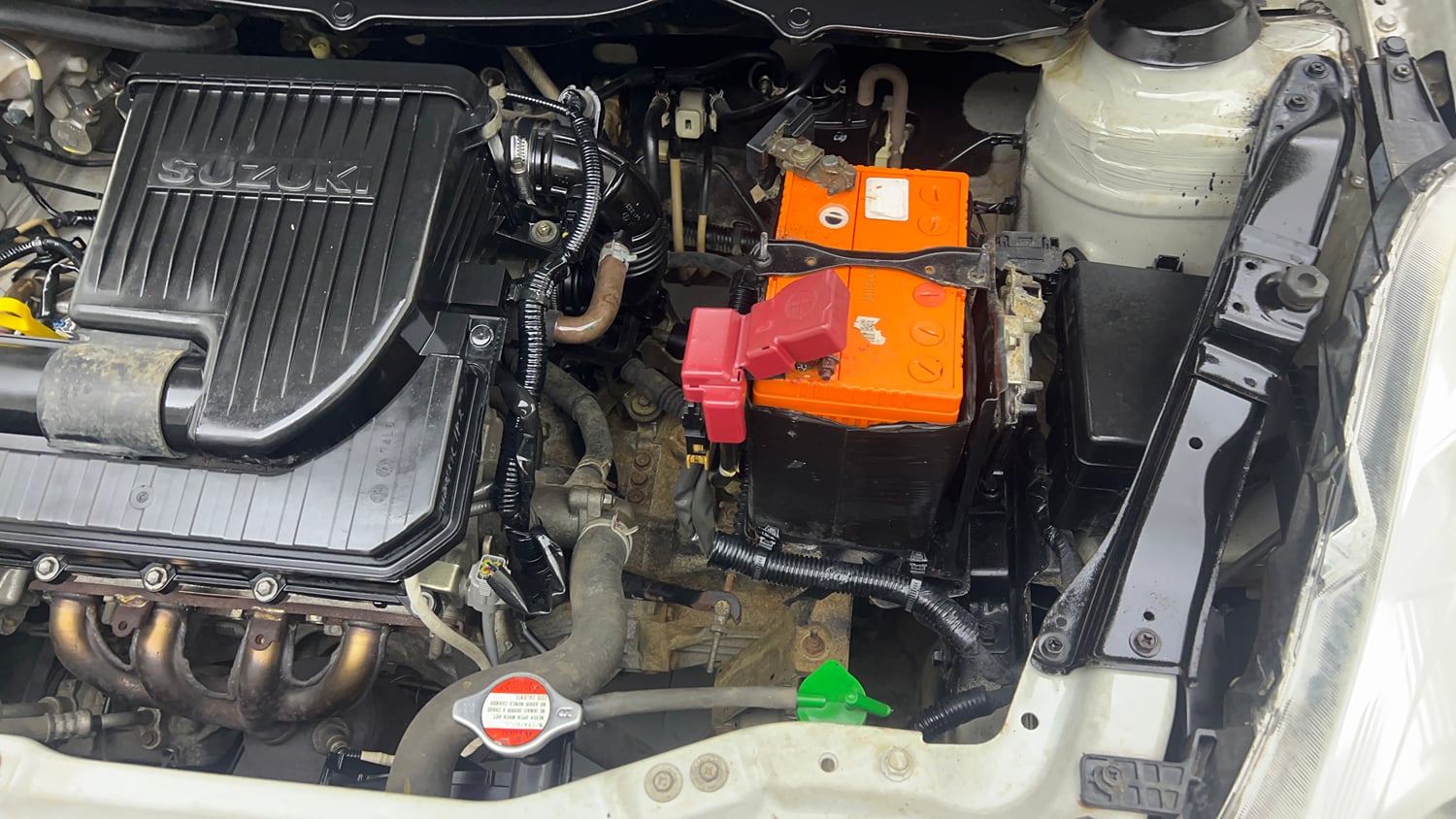 Used 2016 Maruti Suzuki Swift Lxi (O) Petrol Manual engine ENGINE LEFT SIDE VIEW