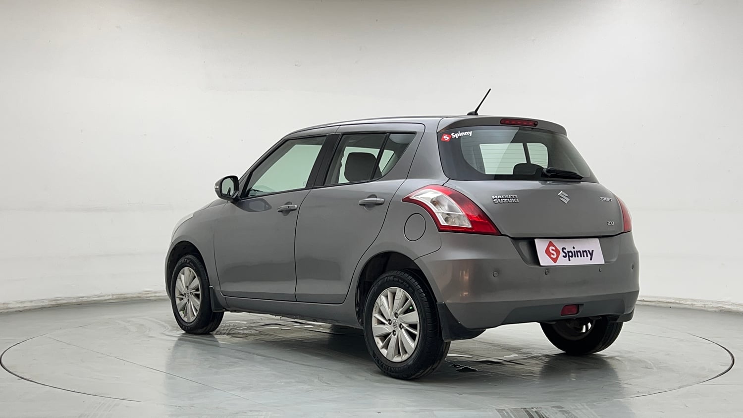 Used 2015 Maruti Suzuki Swift ZXi Petrol Manual exterior LEFT REAR CORNER VIEW