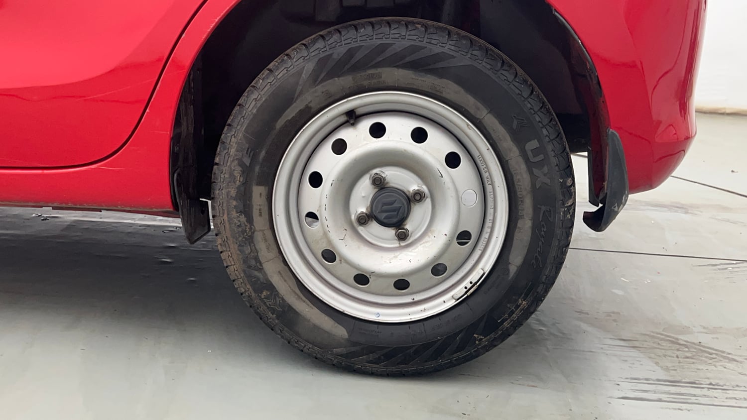 Used 2021 Maruti Suzuki Swift LXi Petrol Manual tyres LEFT REAR TYRE RIM VIEW