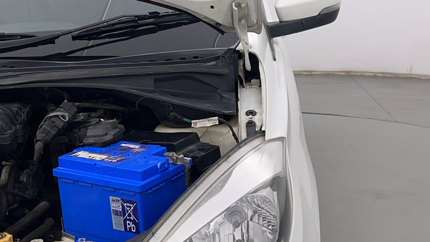 Used 2018 Tata Tiago Revotron XZ Petrol Manual engine ENGINE LEFT SIDE HINGE & APRON VIEW