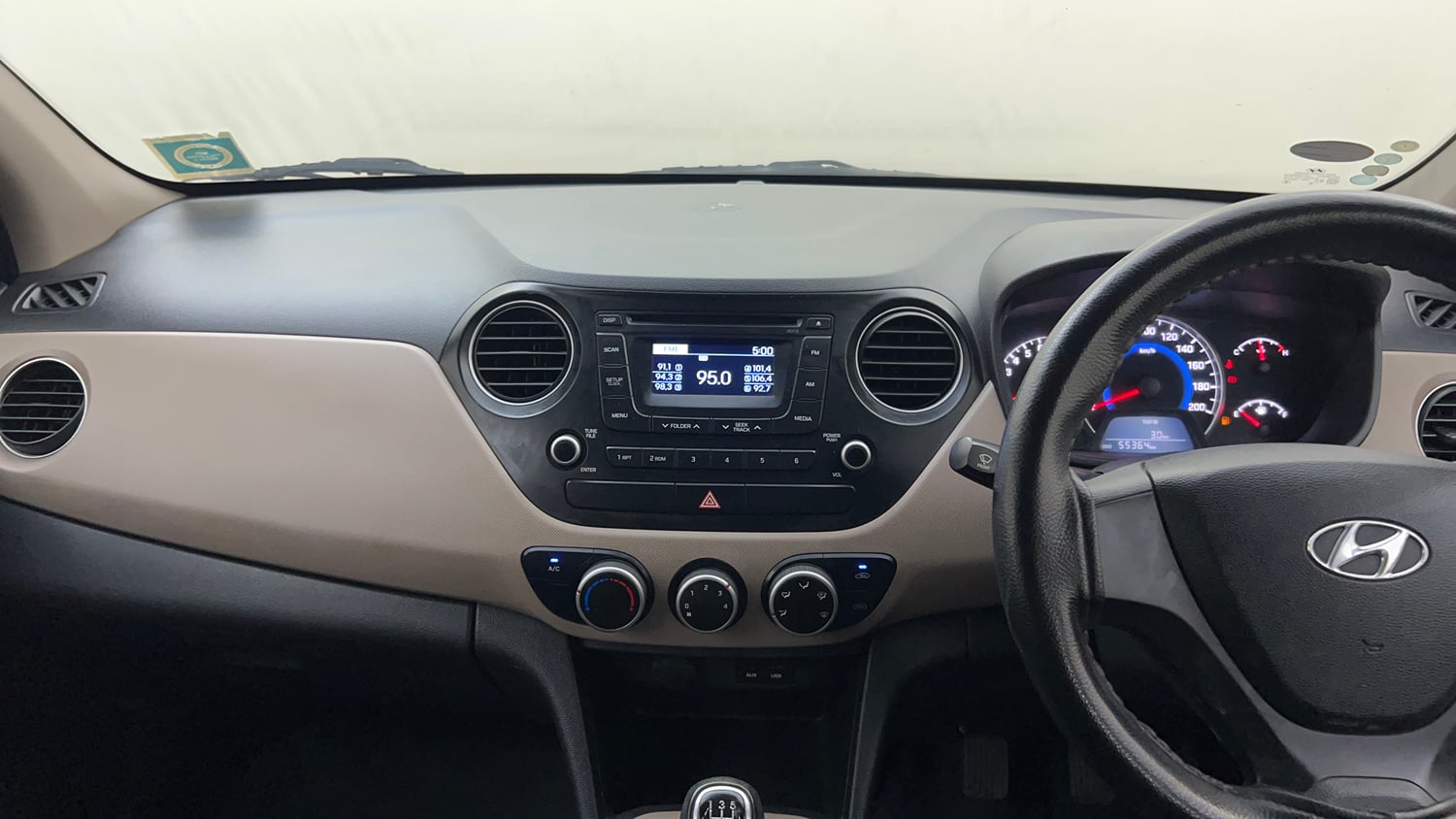 Used 2014 Hyundai Grand i10 Sportz 1.2 Kappa VTVT Petrol Manual interior MUSIC SYSTEM & AC CONTROL VIEW