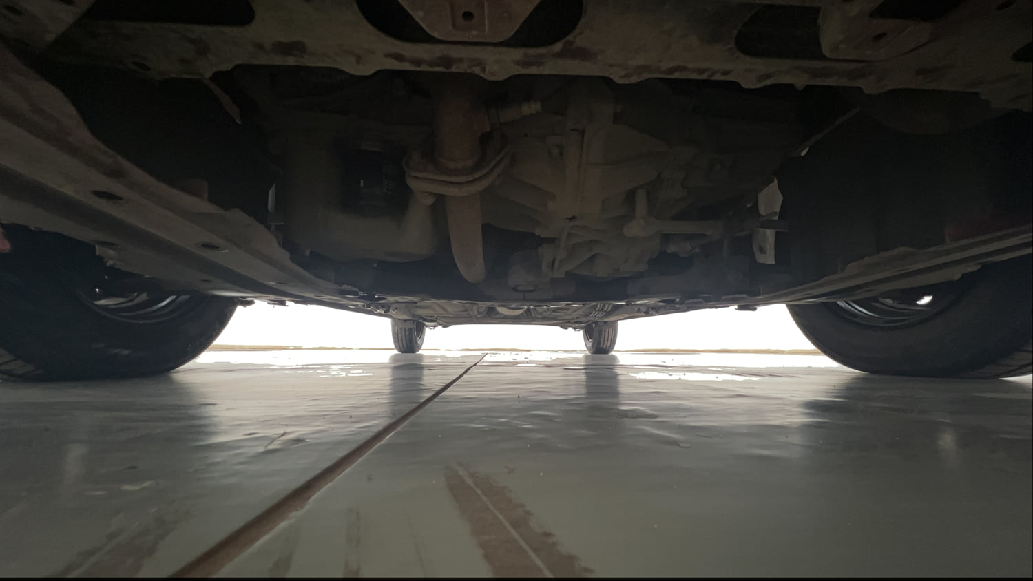 Used 2021 Maruti Suzuki Swift LXi Petrol Manual extra FRONT LEFT UNDERBODY VIEW