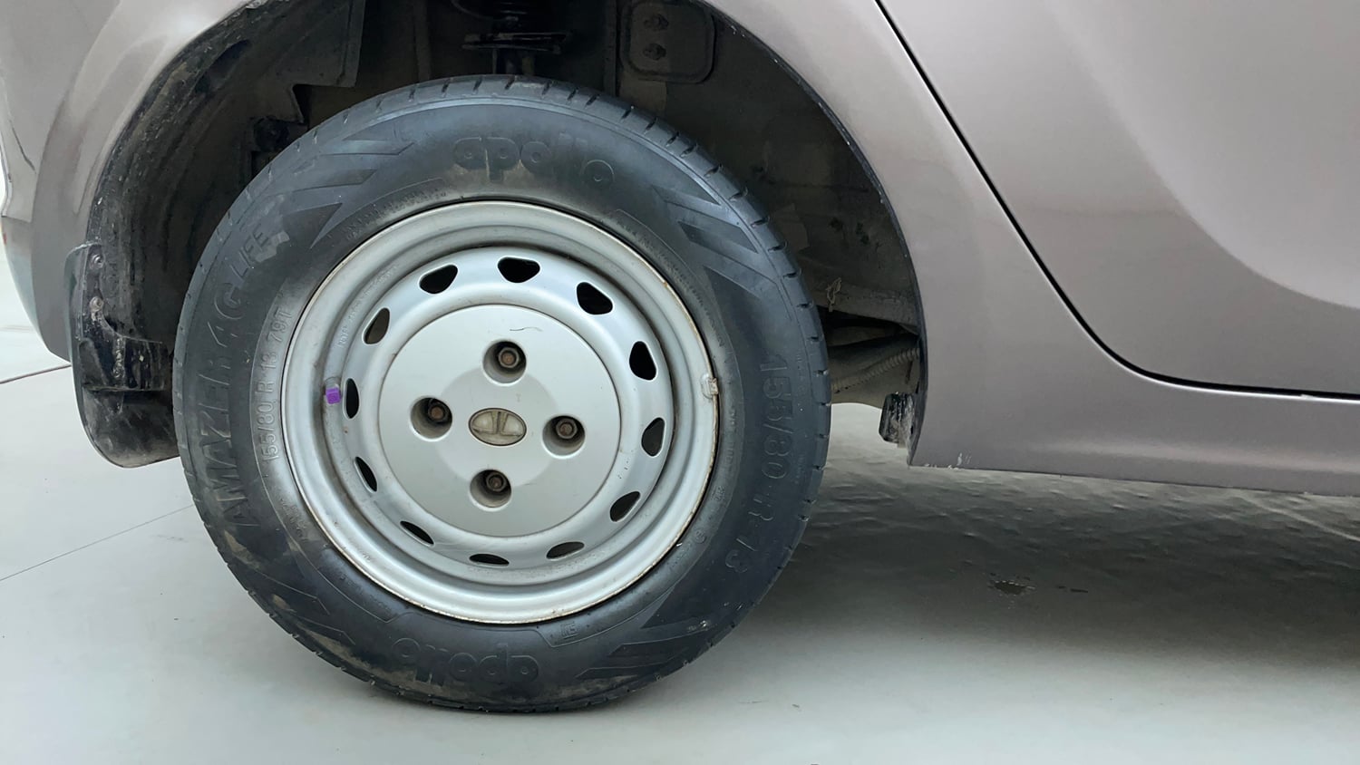 Used 2016 Tata Tiago Revotron XM Petrol Manual tyres RIGHT REAR TYRE RIM VIEW
