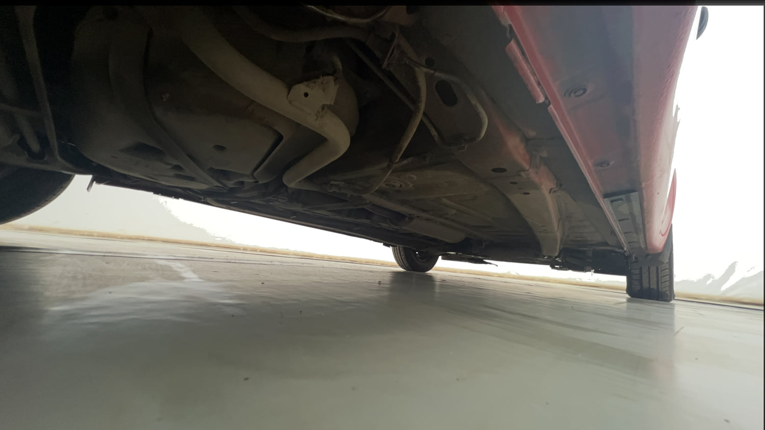 Used 2021 Maruti Suzuki Swift LXi Petrol Manual extra REAR RIGHT UNDERBODY VIEW