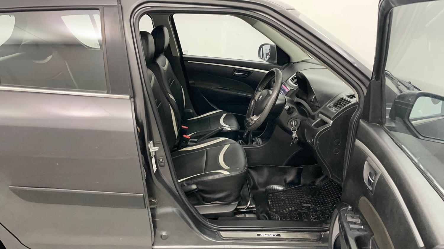Used 2015 Maruti Suzuki Swift VXi Petrol Manual interior RIGHT SIDE FRONT DOOR CABIN VIEW