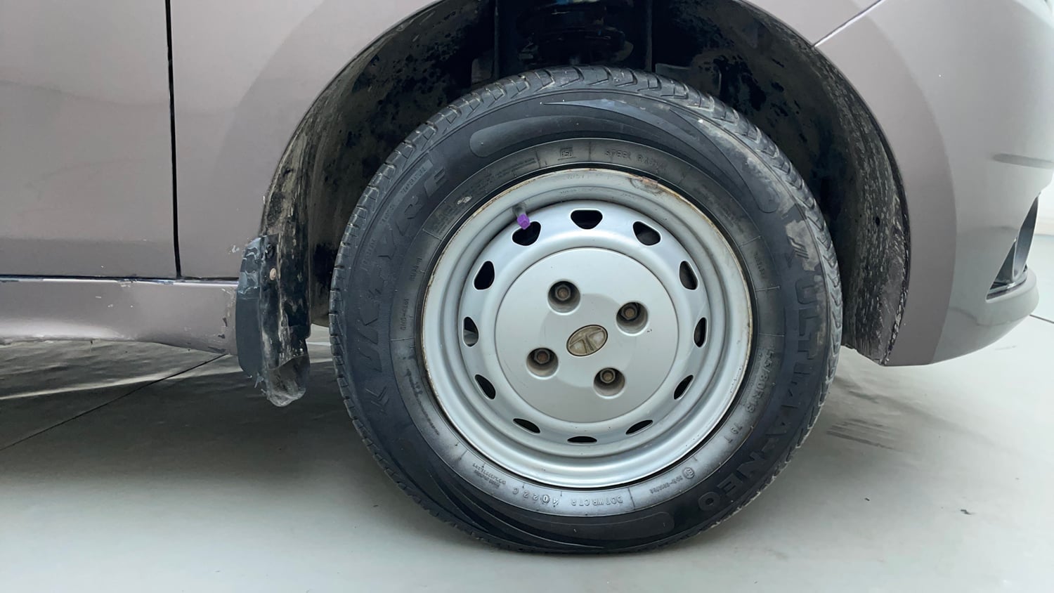 Used 2016 Tata Tiago Revotron XM Petrol Manual tyres RIGHT FRONT TYRE RIM VIEW