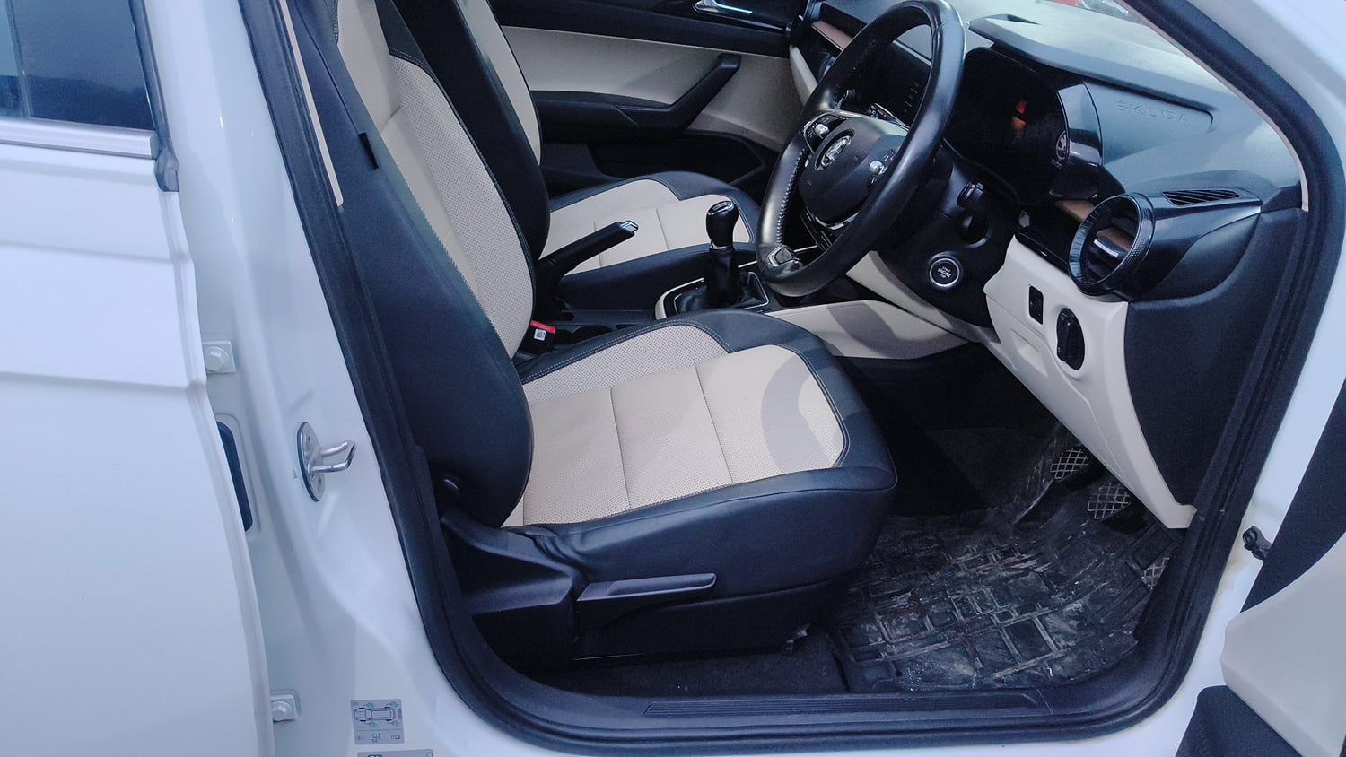 Used 2022 Skoda Slavia Style 1.0L TSI MT Petrol Manual interior RIGHT SIDE FRONT DOOR CABIN VIEW