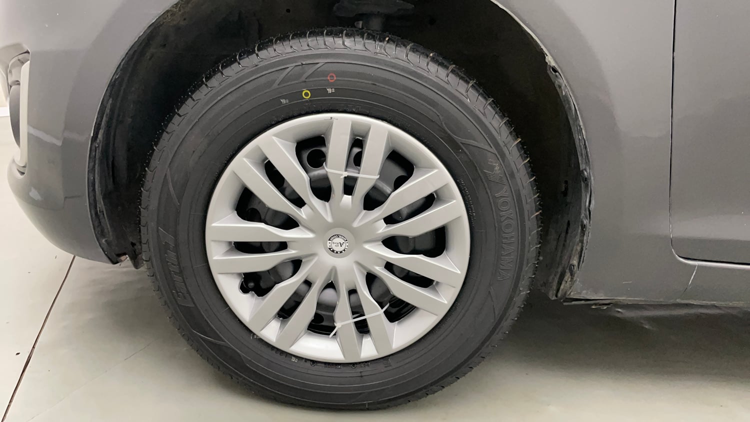 Used 2015 Maruti Suzuki Swift VXi Petrol Manual tyres LEFT FRONT TYRE RIM VIEW