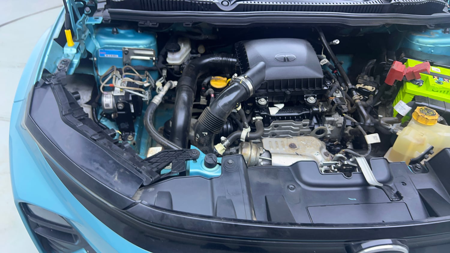 Used 2024 Tata Nexon Creative 1.2 Revotron Petrol 6AMT Petrol Automatic engine ENGINE RIGHT SIDE VIEW