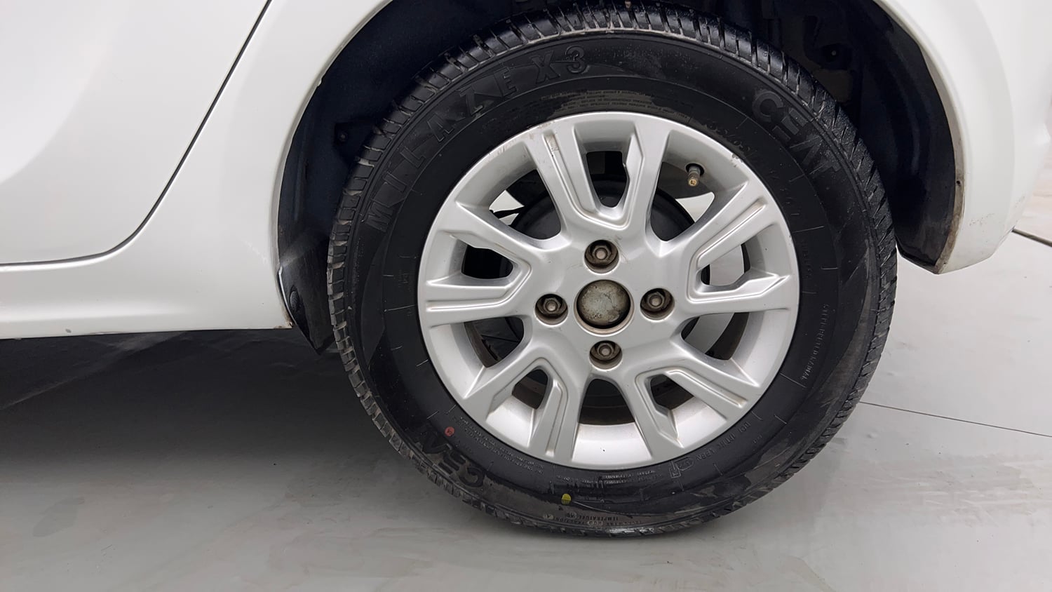 Used 2018 Tata Tiago Revotron XZ Petrol Manual tyres LEFT REAR TYRE RIM VIEW
