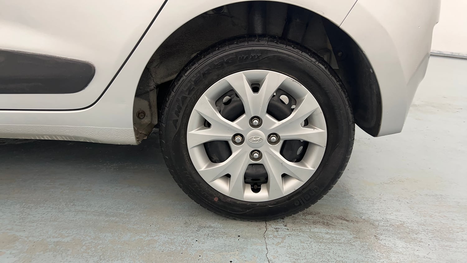 Used 2016 Hyundai Grand i10 Sportz 1.2 Kappa VTVT Petrol Manual tyres LEFT REAR TYRE RIM VIEW