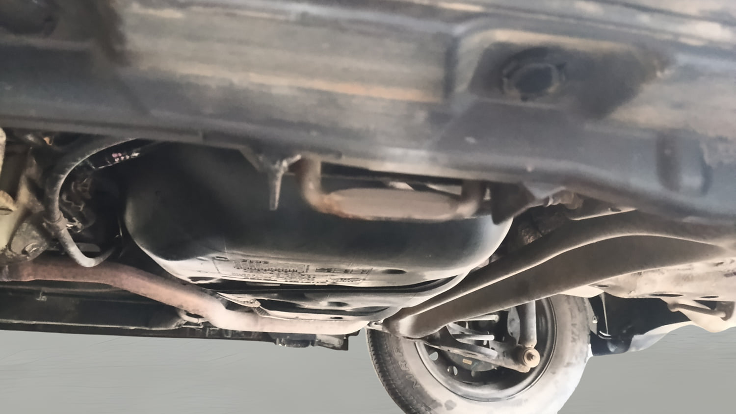 Used 2015 Maruti Suzuki Swift VXi Petrol Manual extra REAR UNDERBODY VIEW (TAKEN FROM REAR)