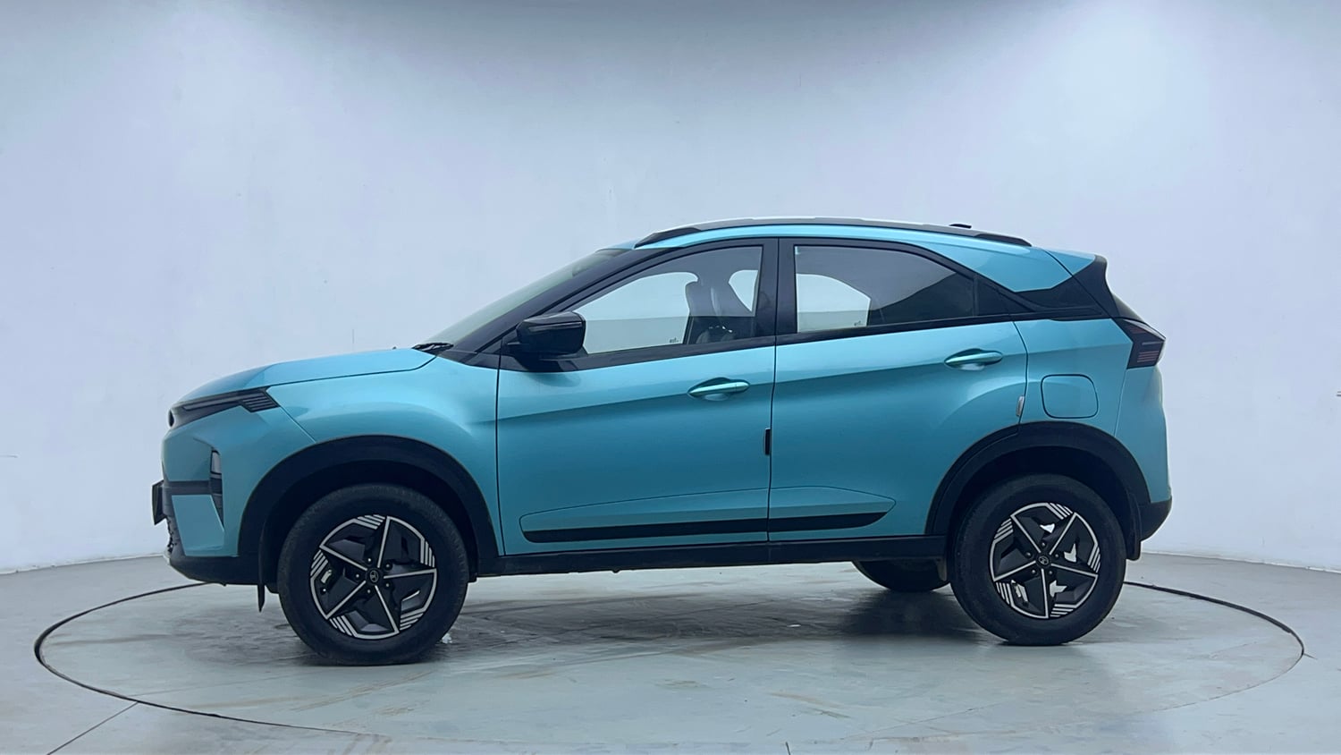 Used 2024 Tata Nexon Creative 1.2 Revotron Petrol 6AMT Petrol Automatic exterior LEFT SIDE VIEW