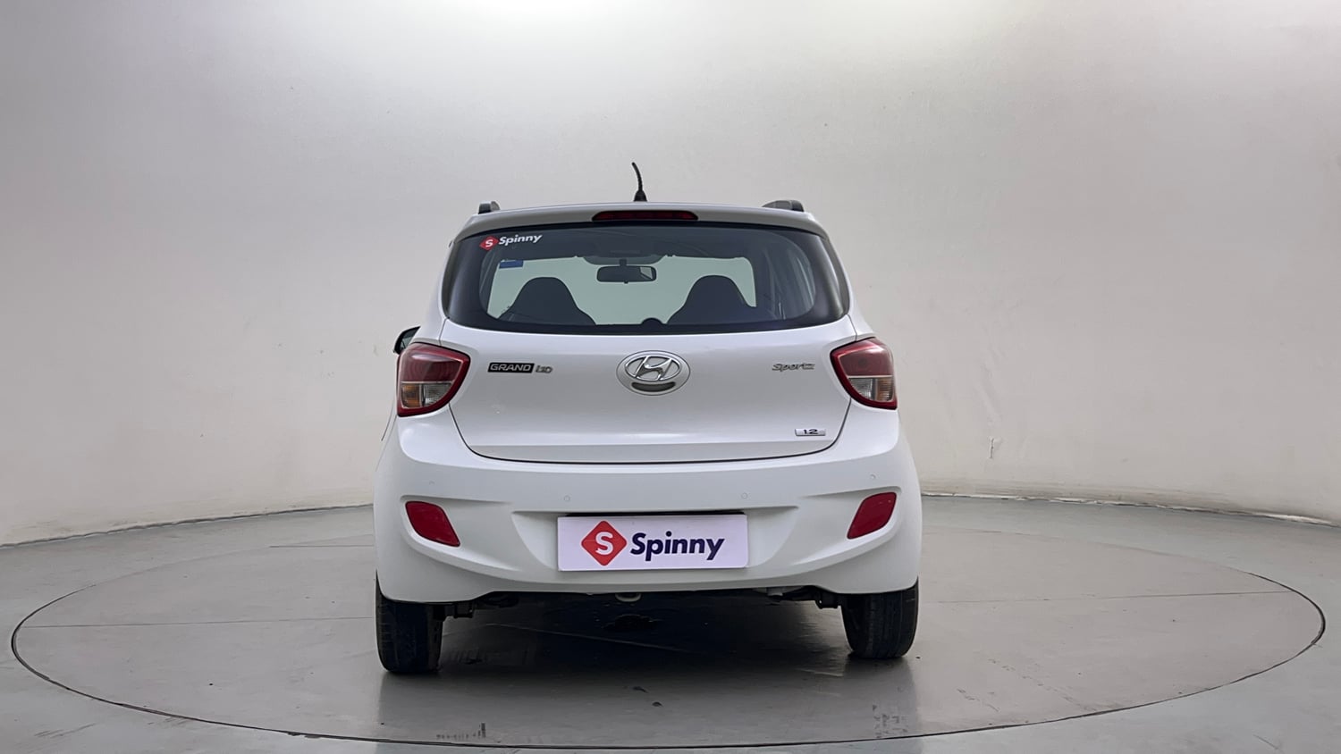Used 2014 Hyundai Grand i10 Sportz 1.2 Kappa VTVT Petrol Manual exterior BACK VIEW