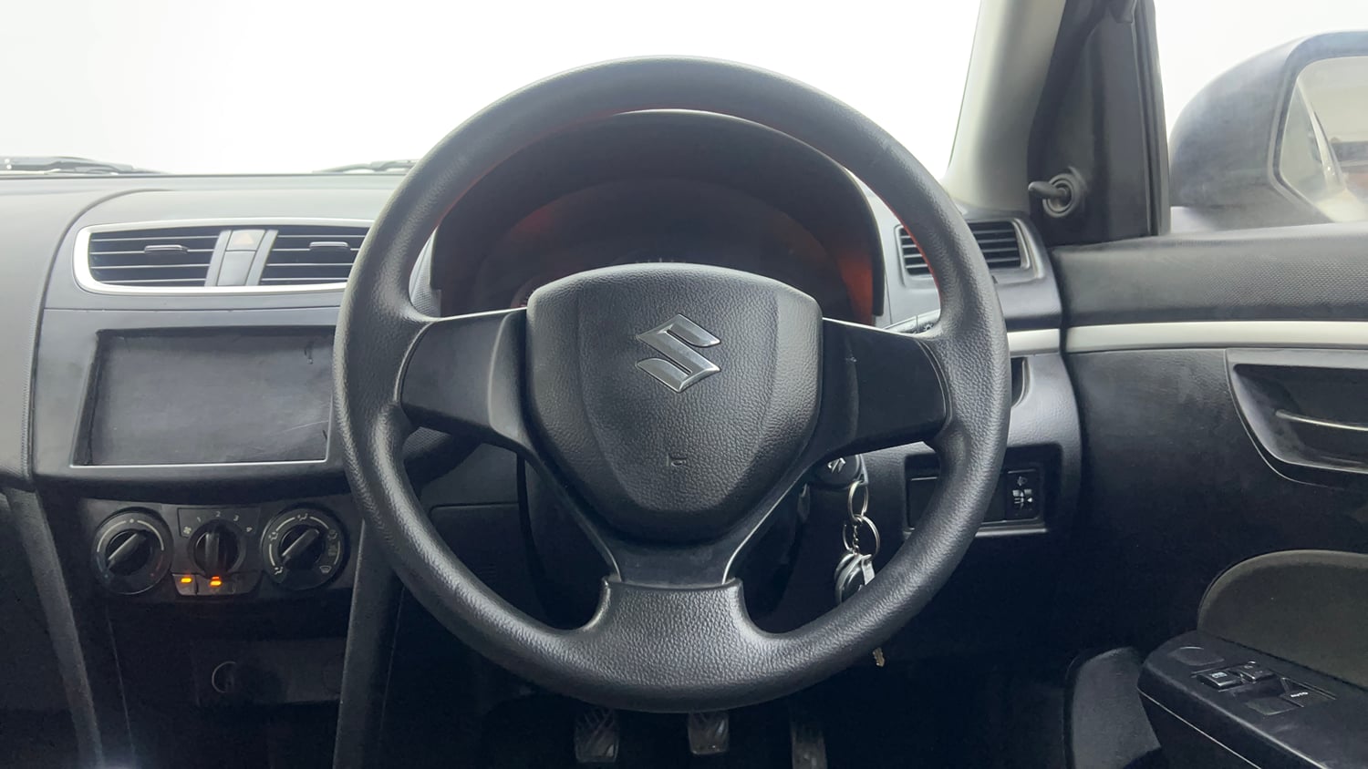Used 2016 Maruti Suzuki Swift Lxi (O) Petrol Manual interior STEERING VIEW