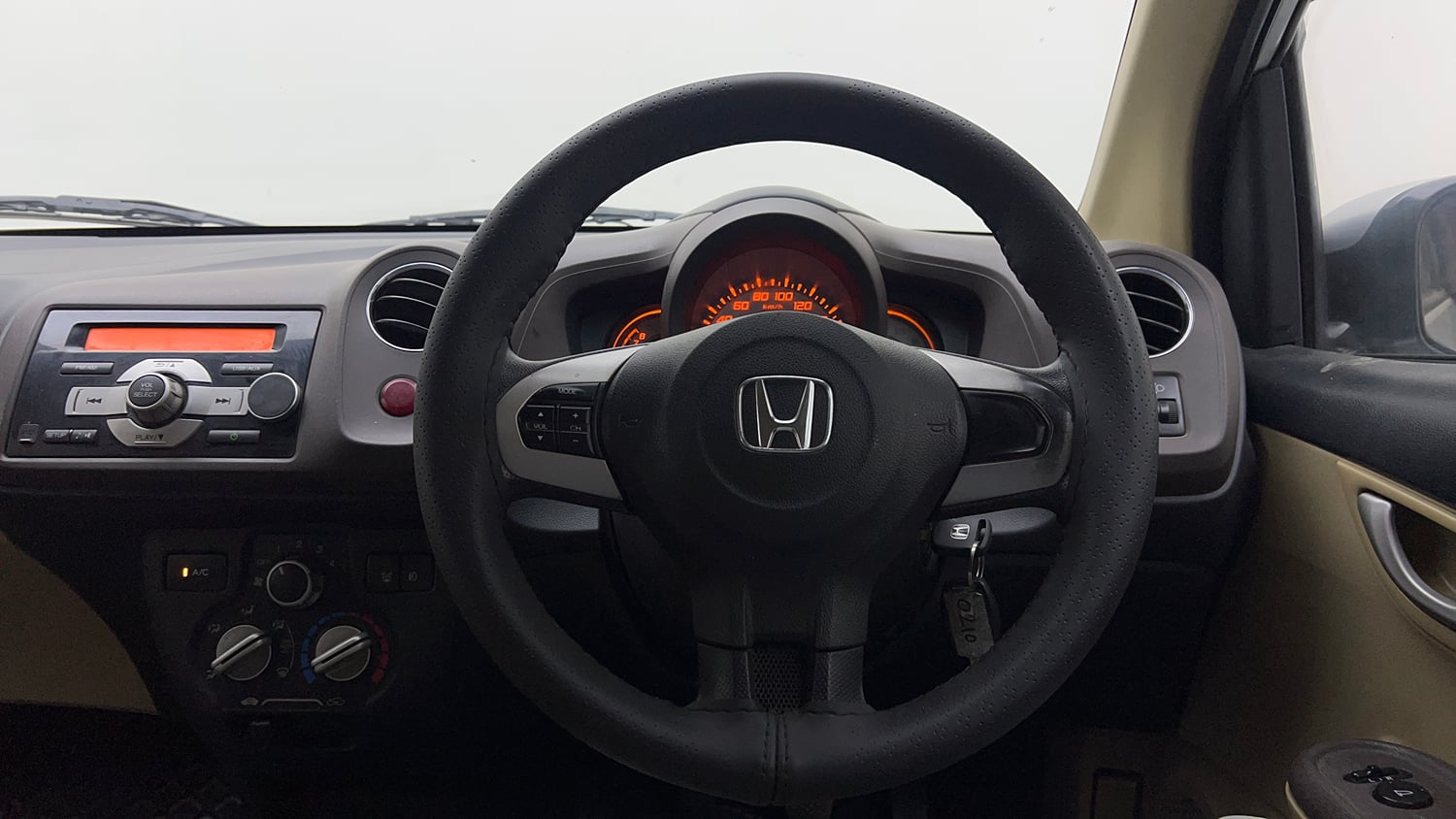 Used 2013 Honda Brio V MT Petrol Manual interior STEERING VIEW