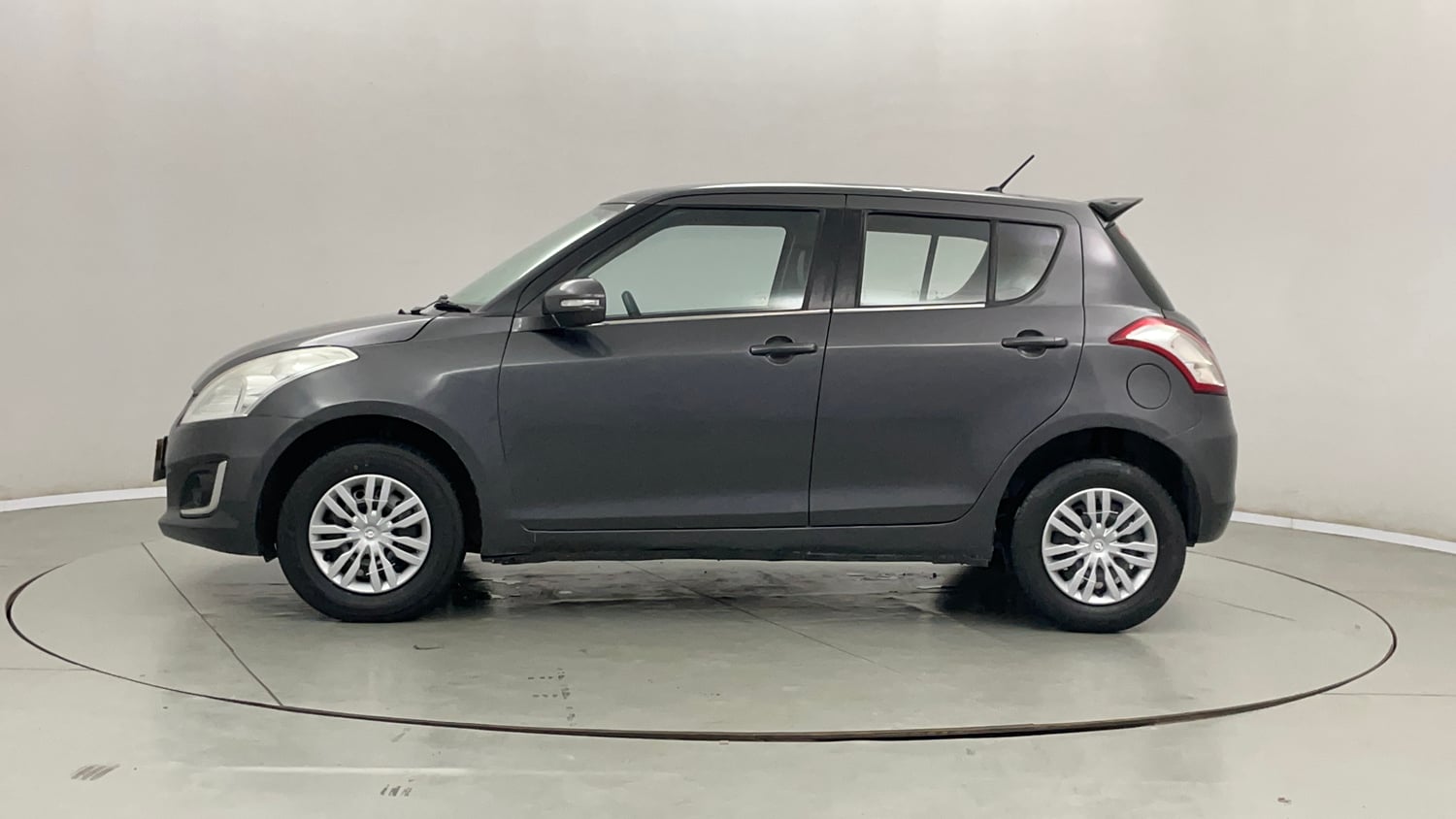 Used 2015 Maruti Suzuki Swift VXi Petrol Manual exterior LEFT SIDE VIEW