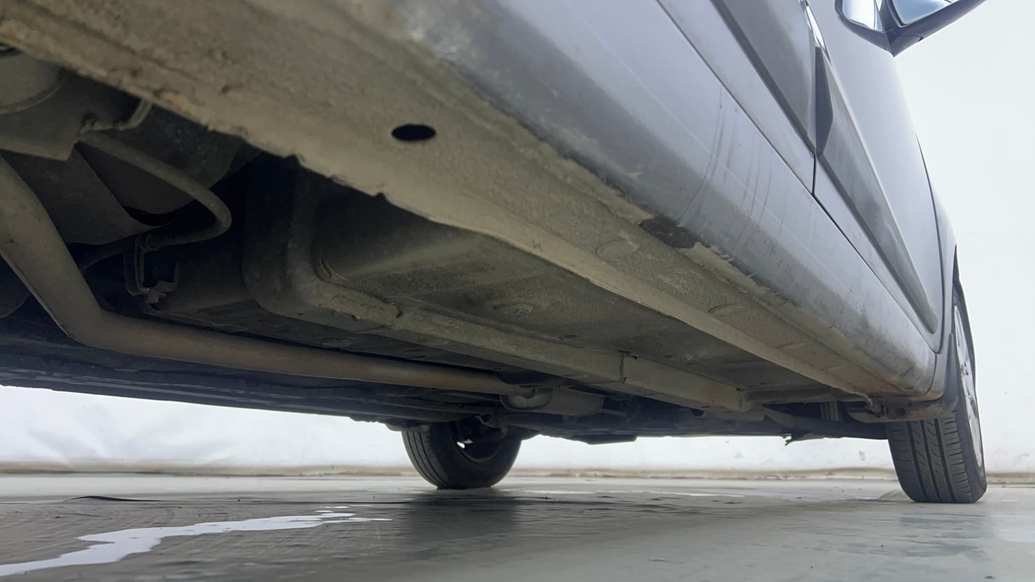 Used 2014 Hyundai Grand i10 Sportz AT 1.2 Kappa VTVT Petrol Automatic extra REAR RIGHT UNDERBODY VIEW