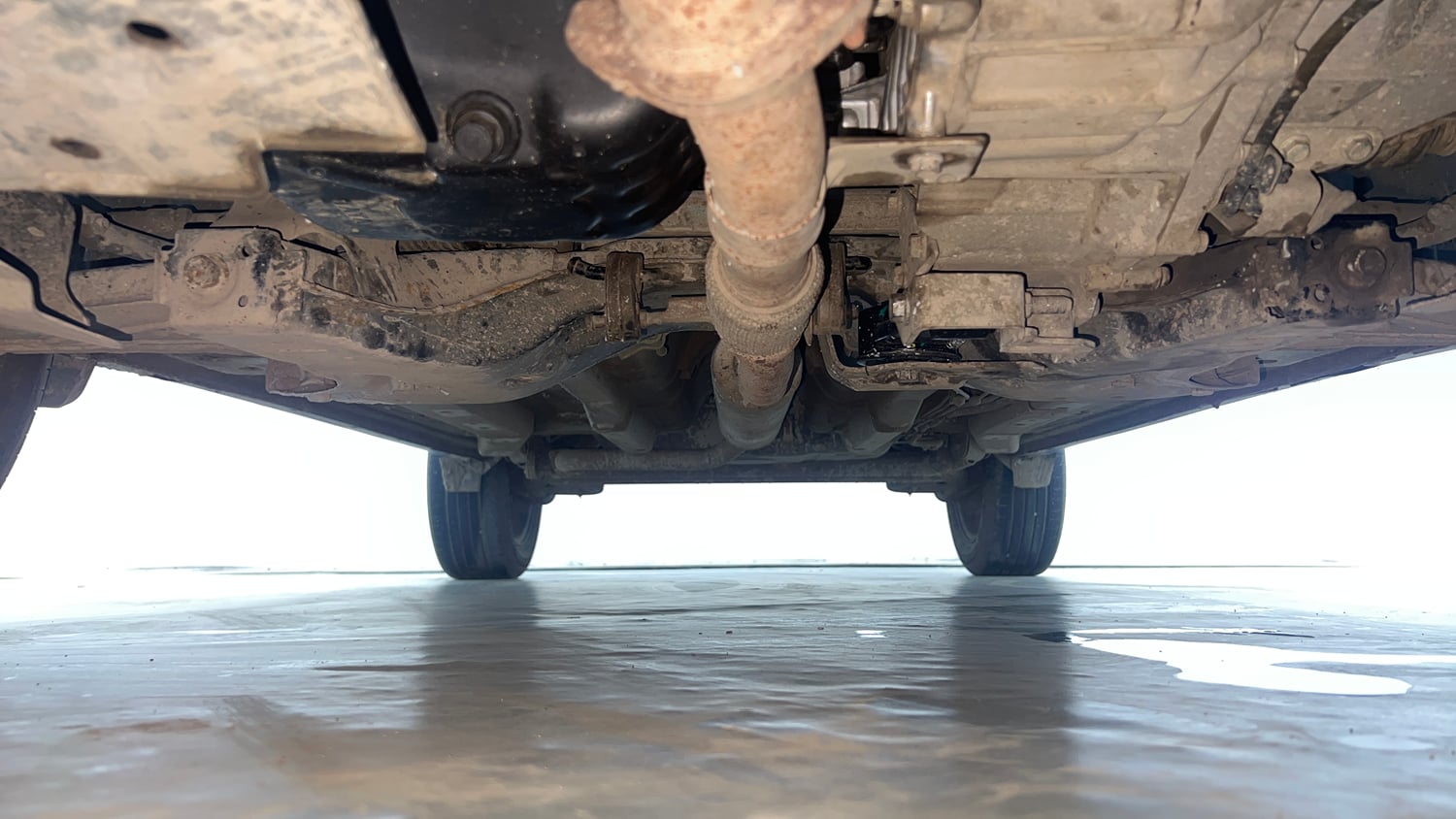 Used 2024 Tata Nexon Creative 1.2 Revotron Petrol 6AMT Petrol Automatic extra FRONT LEFT UNDERBODY VIEW