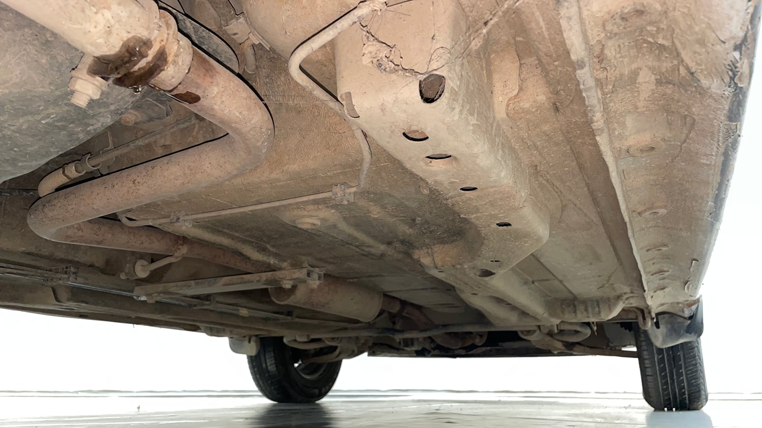 Used 2016 Tata Tiago Revotron XM Petrol Manual extra REAR RIGHT UNDERBODY VIEW