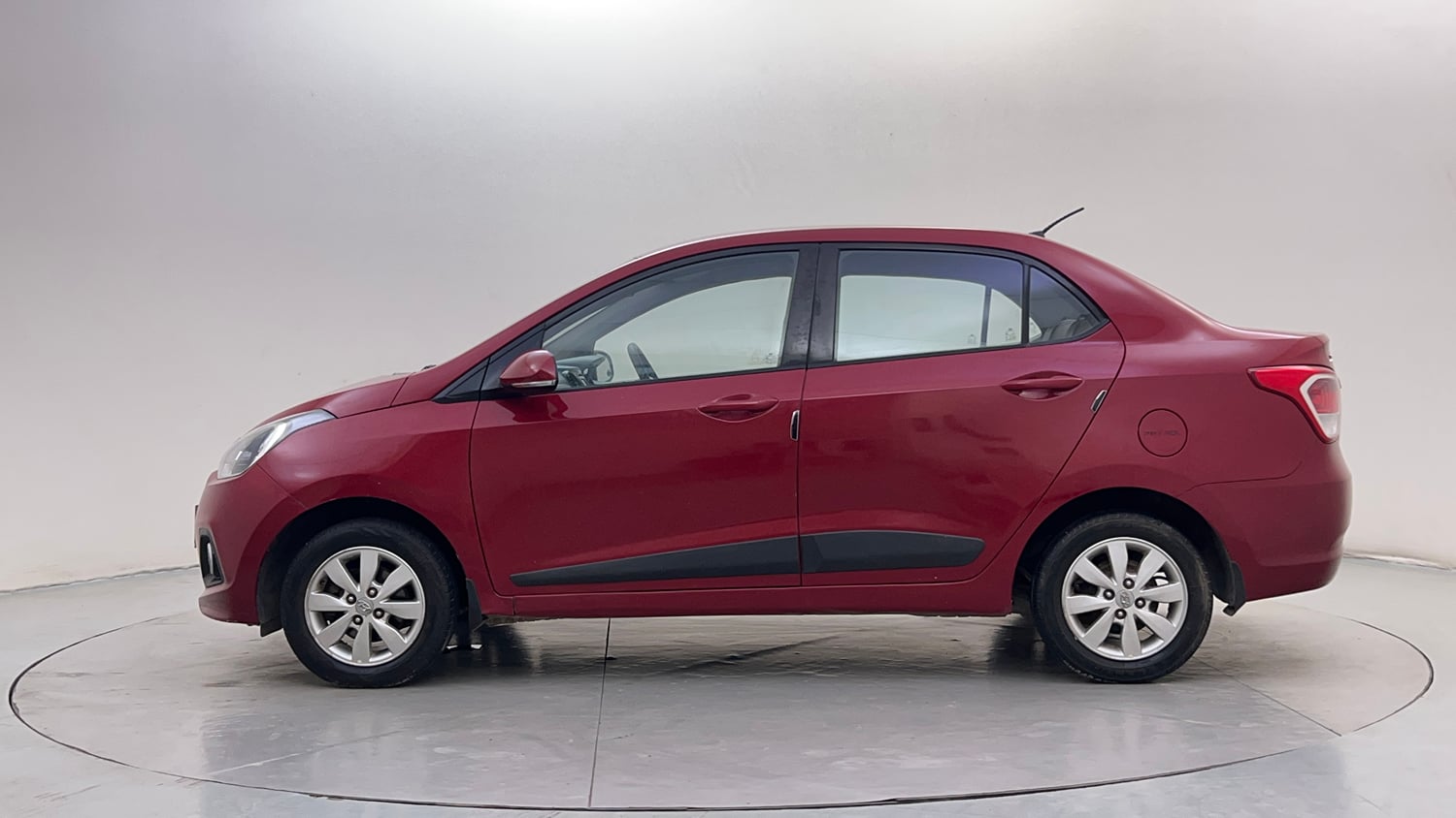 Used 2014 Hyundai Xcent S 1.2 Petrol Manual exterior LEFT SIDE VIEW