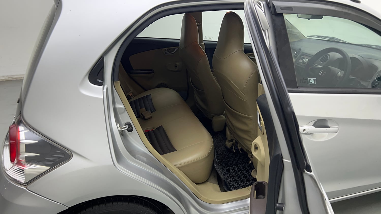 Used 2013 Honda Brio V MT Petrol Manual interior RIGHT SIDE REAR DOOR CABIN VIEW