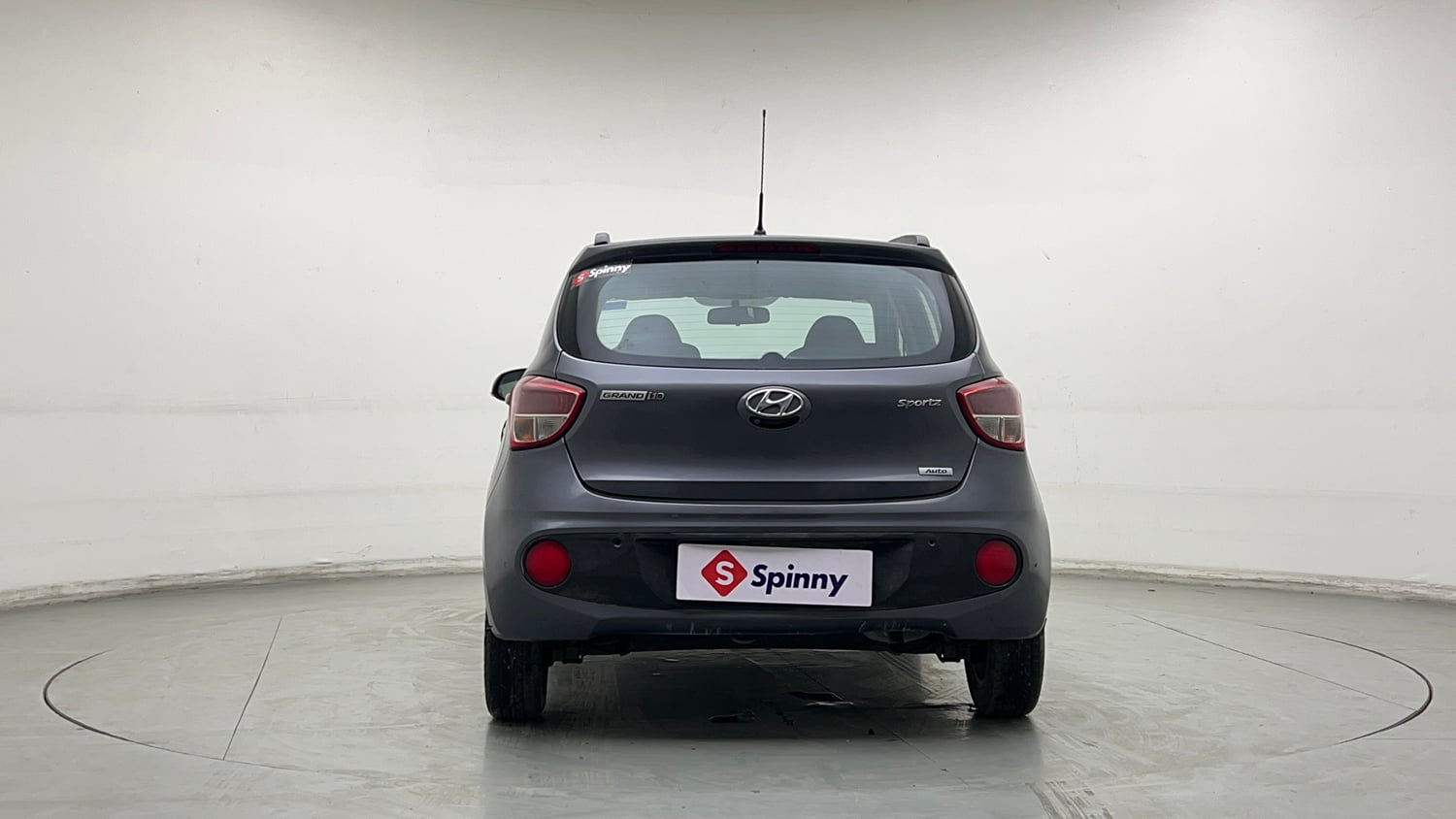 Used 2017 Hyundai Grand i10 Sportz (O) AT 1.2 Kappa VTVT Petrol Automatic exterior BACK VIEW