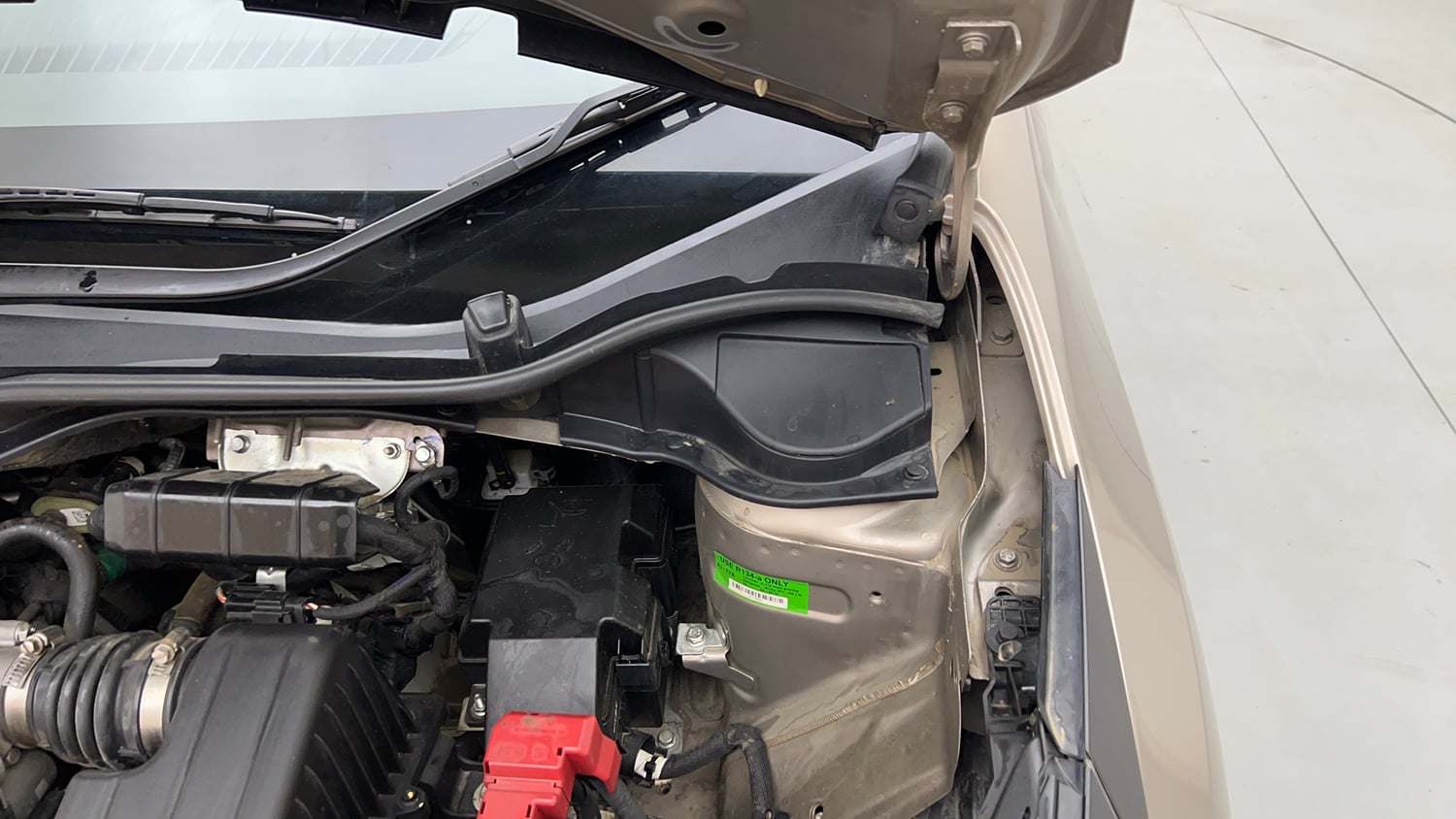 Used 2025 Tata Altroz Creative S Petrol 5AMT Petrol Automatic engine ENGINE LEFT SIDE HINGE & APRON VIEW