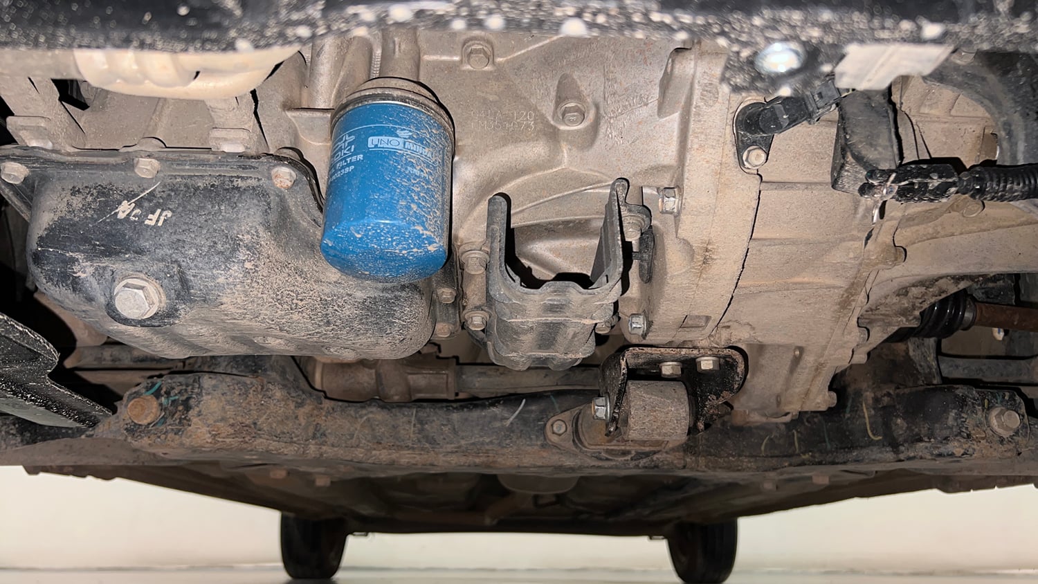 Used 2014 Hyundai Grand i10 Sportz 1.2 Kappa VTVT Petrol Manual extra FRONT LEFT UNDERBODY VIEW