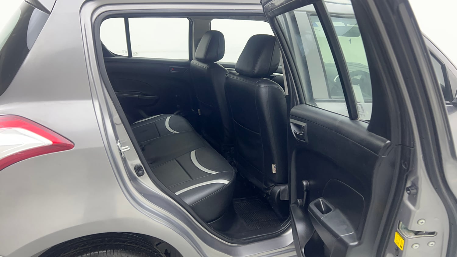 Used 2015 Maruti Suzuki Swift Lxi (O) Petrol Manual interior RIGHT SIDE REAR DOOR CABIN VIEW