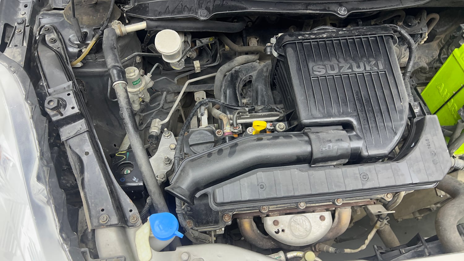 Used 2015 Maruti Suzuki Swift Lxi (O) Petrol Manual engine ENGINE RIGHT SIDE VIEW