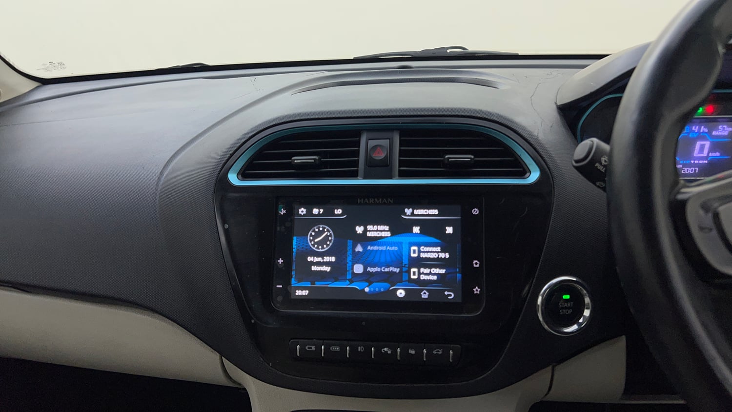 Used 2023 Tata Tiago EV XZ Plus Tech LUX Long Range Electric Automatic top_features Integrated (in-dash) music system