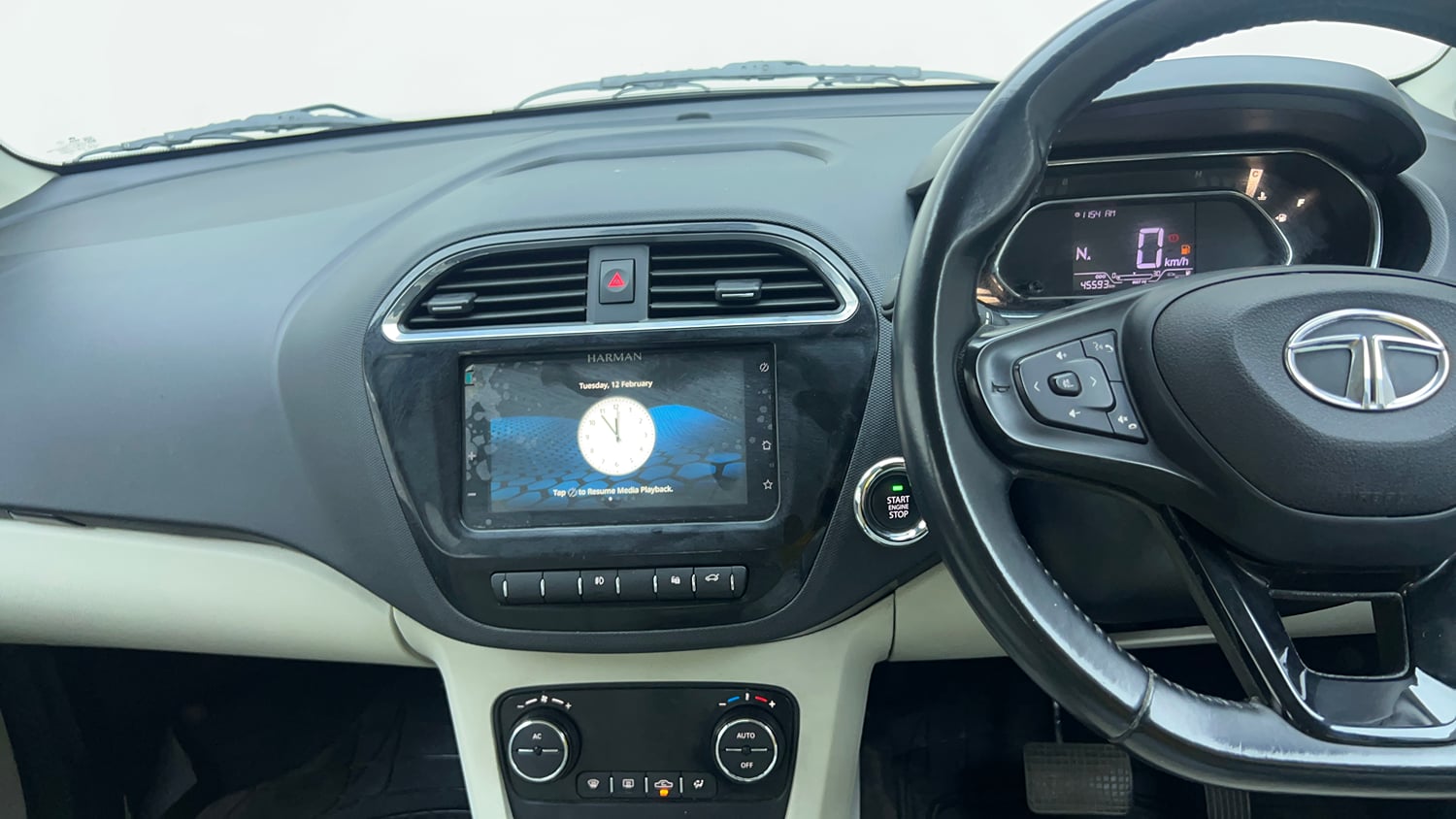 Used 2023 Tata Tigor XZA Plus Leatherette Pack Petrol Automatic top_features Integrated (in-dash) music system