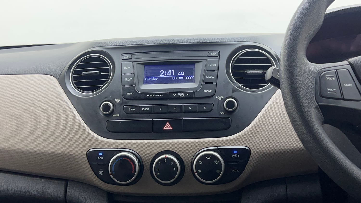 Used 2016 Hyundai Grand i10 Sportz 1.2 Kappa VTVT Petrol Manual interior MUSIC SYSTEM & AC CONTROL VIEW