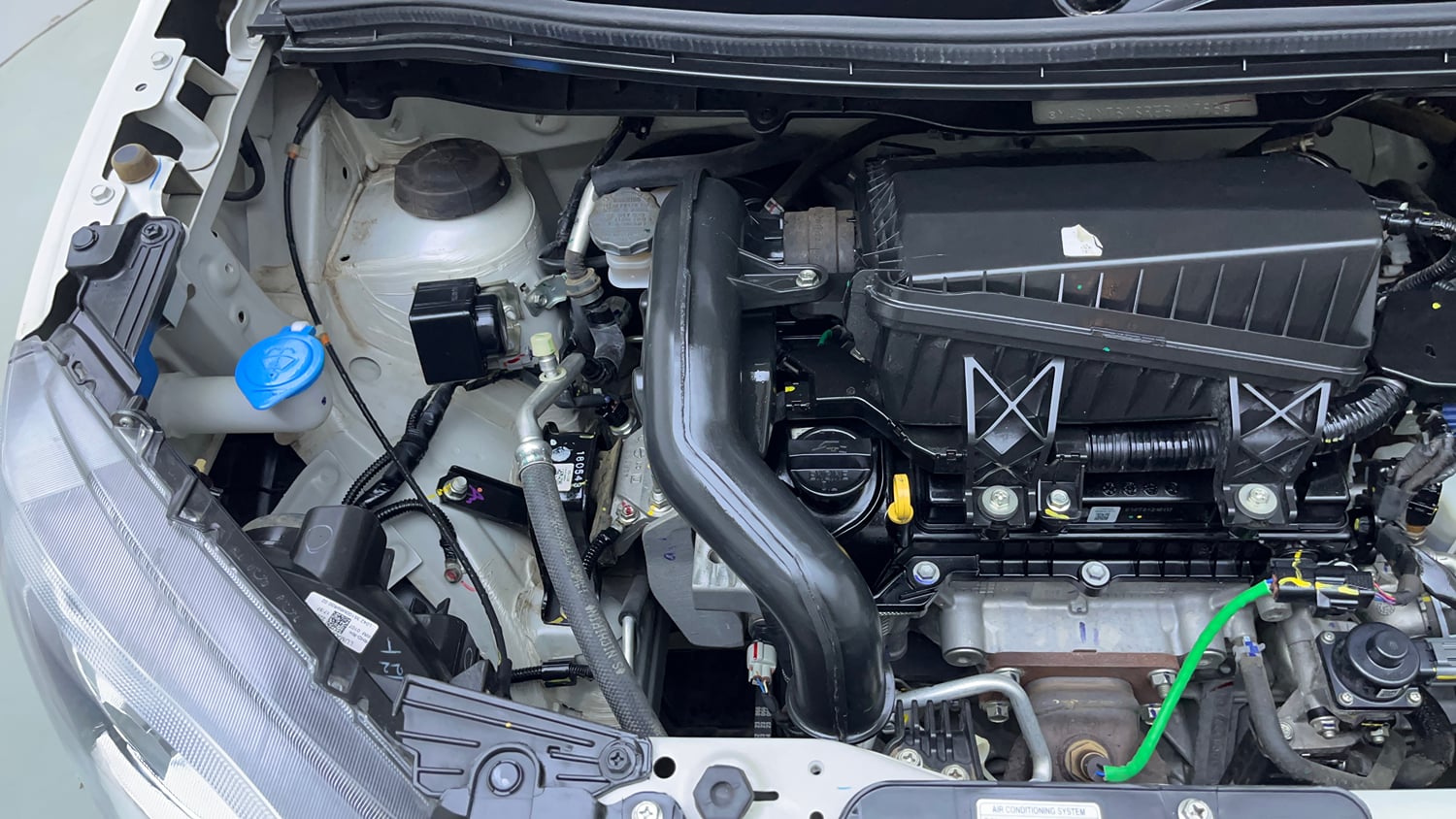 Used 2024 Maruti Suzuki Wagon R VXI 1.0 AGS Petrol Automatic engine ENGINE RIGHT SIDE VIEW