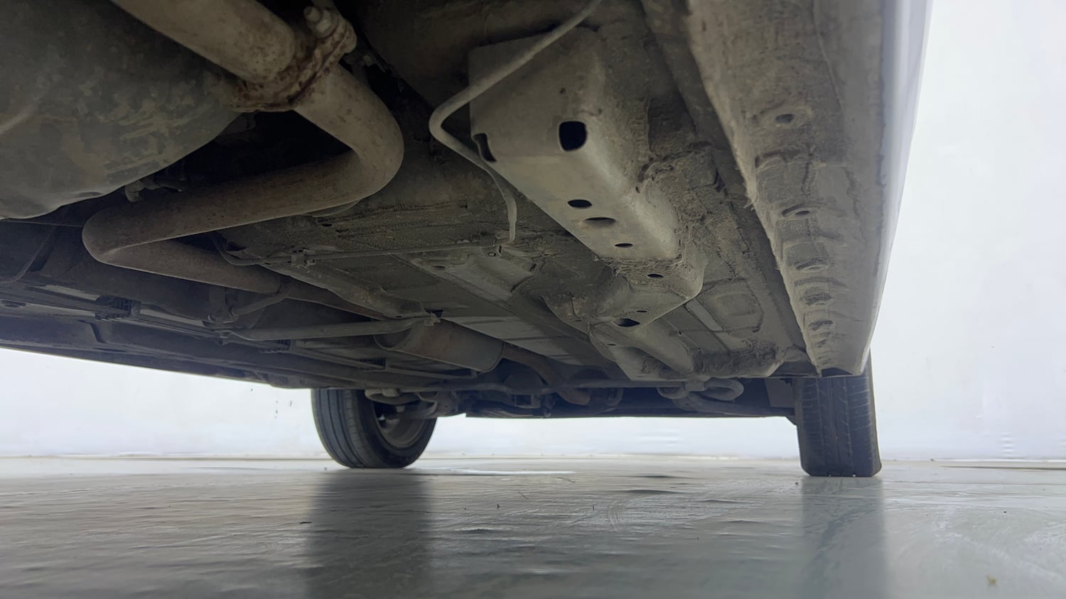Used 2023 Tata Tigor XZA Plus Leatherette Pack Petrol Automatic extra REAR RIGHT UNDERBODY VIEW