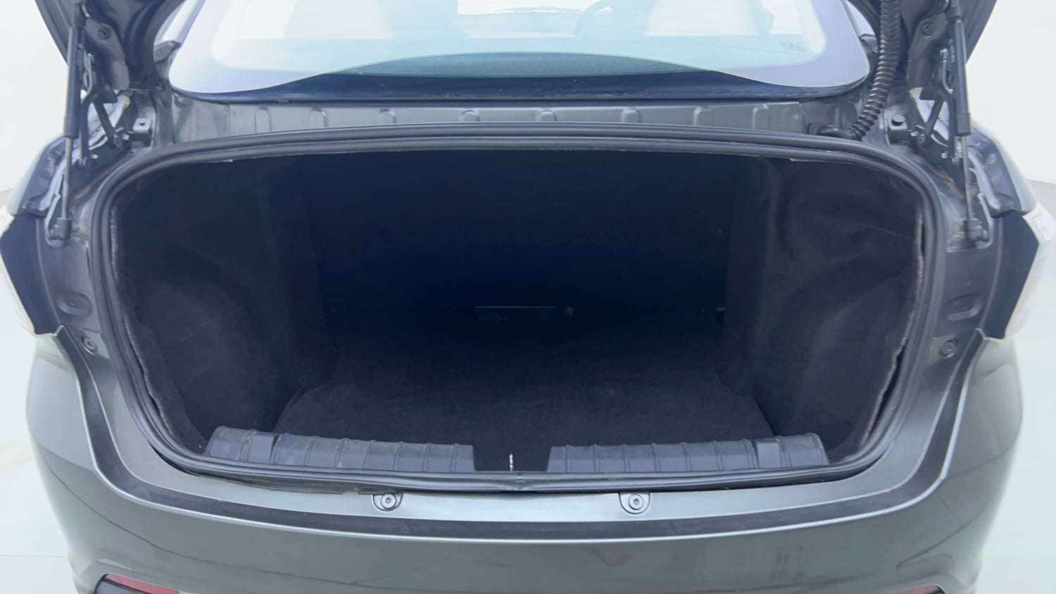 Used 2023 Tata Tigor XZA Plus Leatherette Pack Petrol Automatic interior DICKY INSIDE VIEW