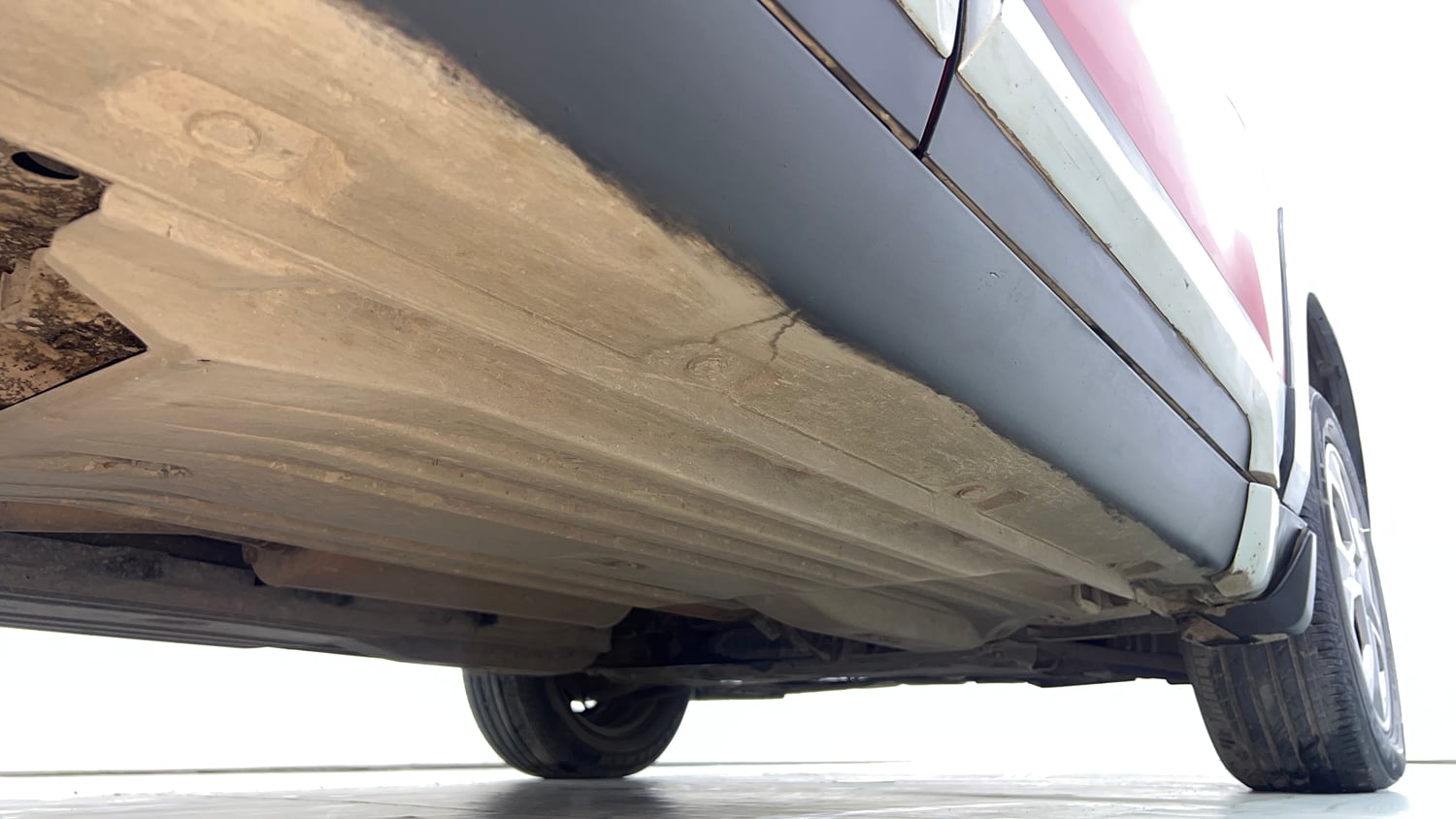 Used 2022 Maruti Suzuki Brezza Vxi AT Petrol Automatic extra REAR RIGHT UNDERBODY VIEW