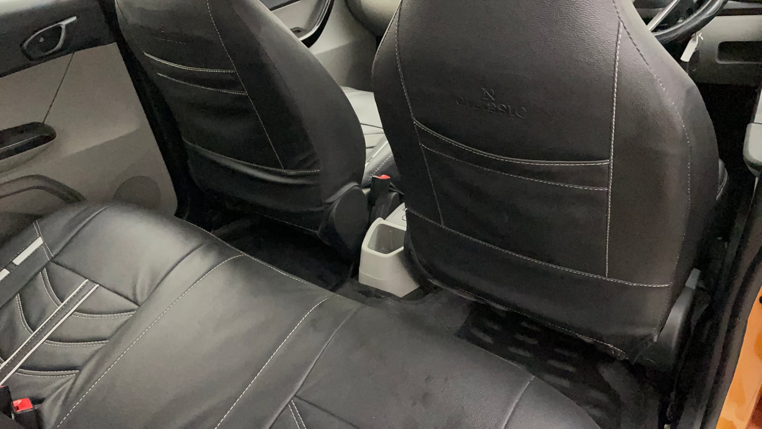 Used 2017 Tata Tiago Revotron XM Petrol Manual top_features Front seat pockets