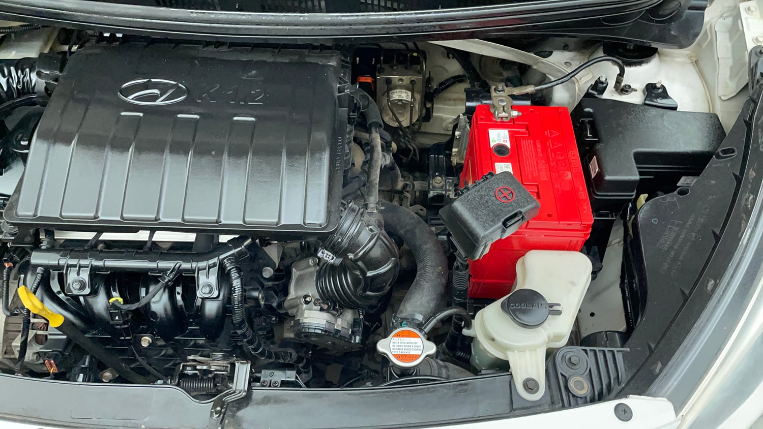 Used 2014 Hyundai Xcent S 1.2 (O) Petrol Manual engine ENGINE LEFT SIDE VIEW